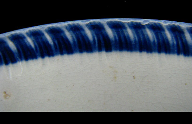 Unscalloped with blue edge design from the Federal Reserve site (18BC27).